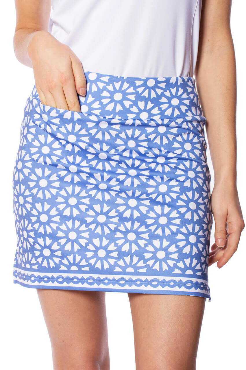 Women's golf skort in periwinkle and white print