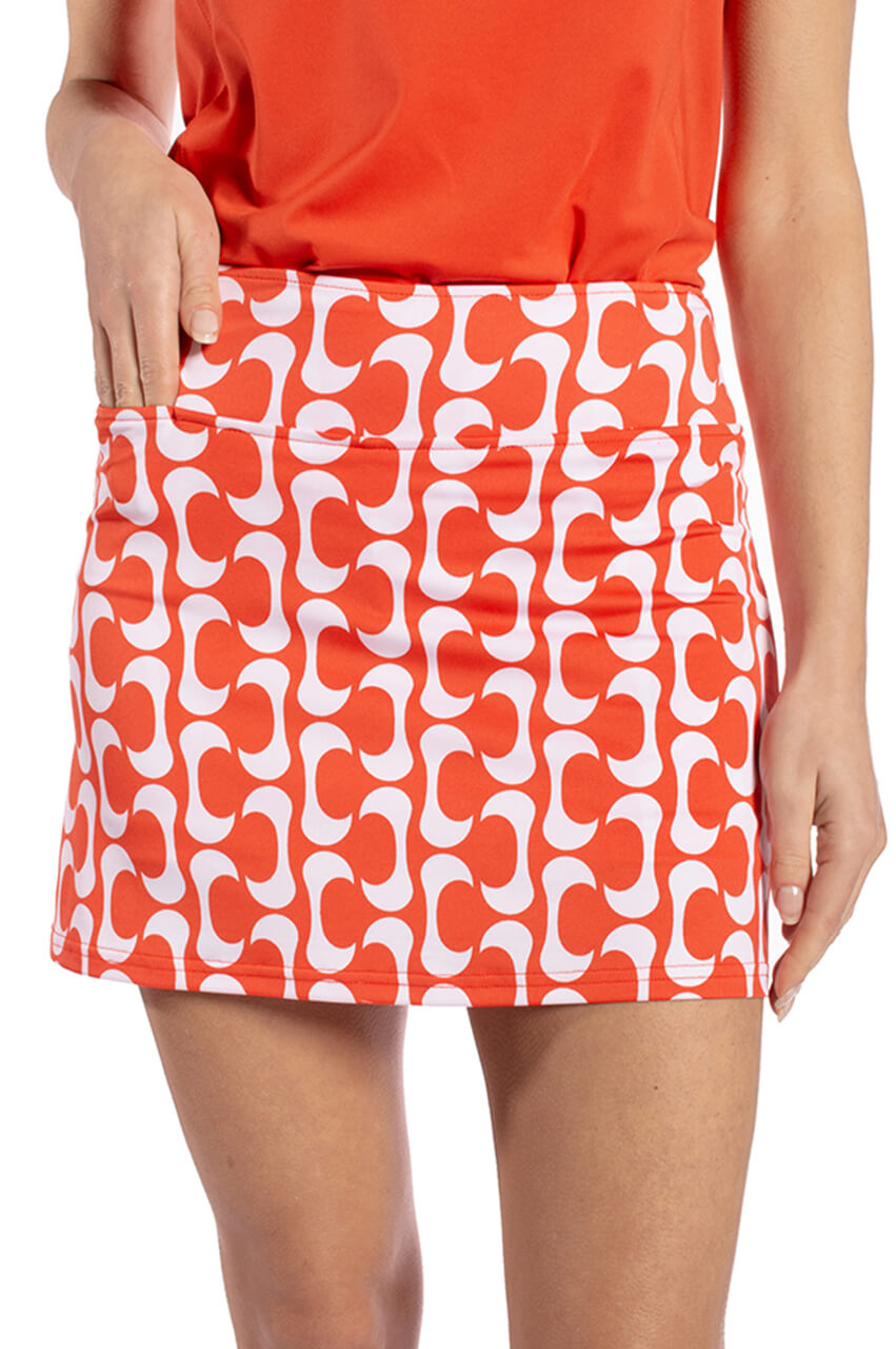 Orange skort with hidden tee pocket in front and back scorecard pocket