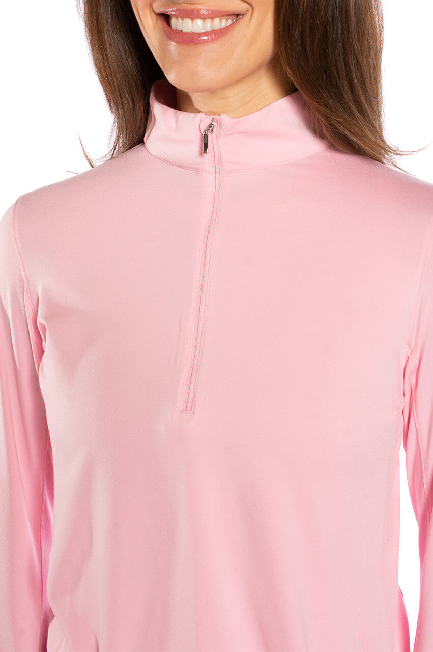Women's pink stretch golf pullover with silver sleeve accents and quarter zip collar