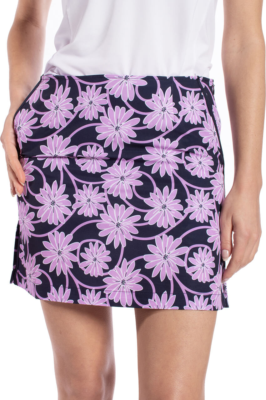 Cute floral womens golf skort with matching white sports polo