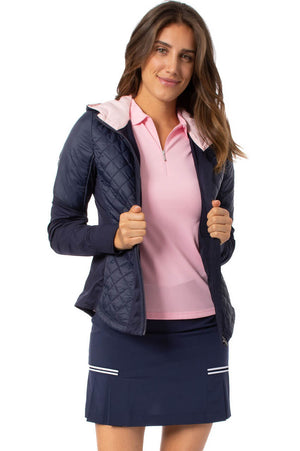 Women's navy and light pink matching golf outfit with hooded windbreaker jacket and best selling navy golf skirt