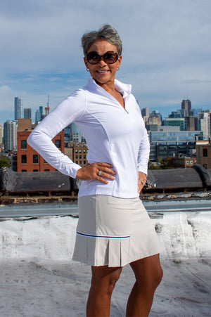 Khaki sport skirt with white long sleeve sun protection polo