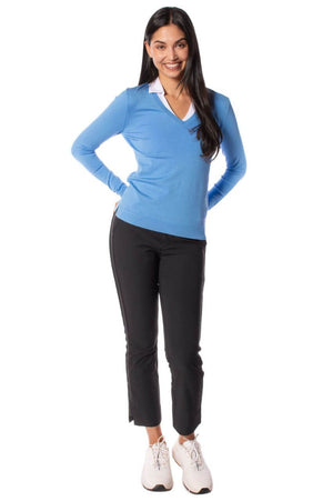 Women's light blue stretch v-neck sweater and black stretch cropped pant