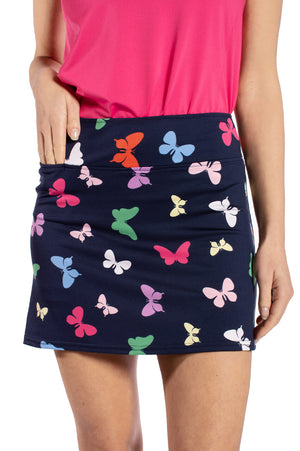 Women's butterflies skort in navy with hidden front tee pocket and multicolor butterfly print