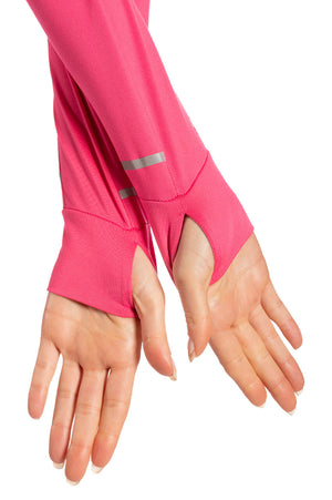 Women's pink quarter zip pullover with thumbholes and silver accents on sleeves