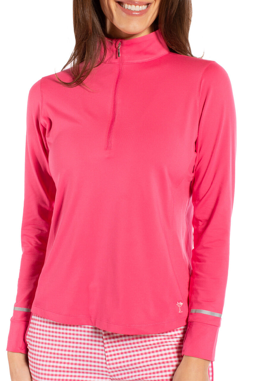 Women's pink stretch golf pullover with silver sleeve accents and quarter zip collar