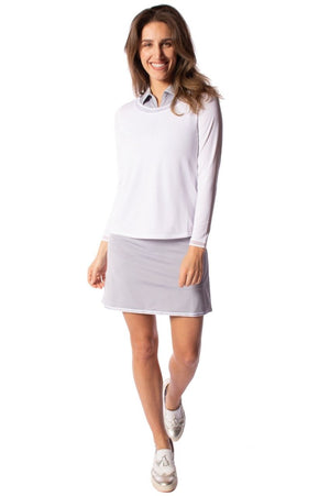 Women's silver matching set for golf and tennis with lightweight sun protection and layering top