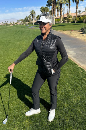 Women's black cropped golf pant with black tech vest