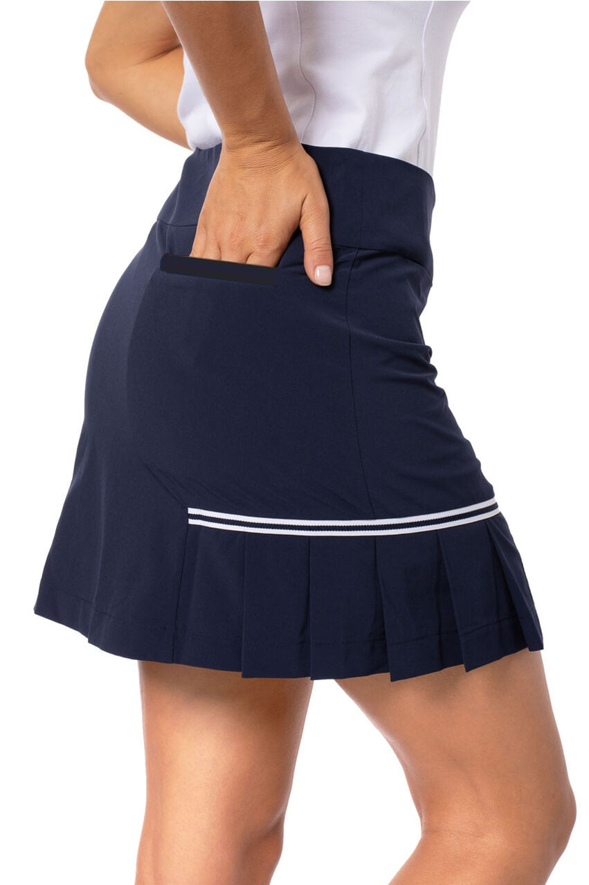 Navy golf skort with white striped grosgrain trim and cute pleats on the side 