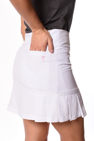 Flattering white golf skort with pleats and a charcoal top