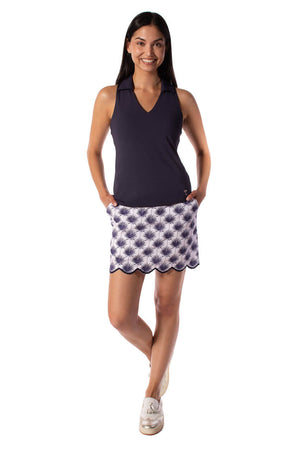 Women's navy golf outfit with a stretch cotton skort and navy sleeveless polo