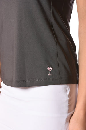 Martini Womens sleeveless zip polo with matching white golf skort