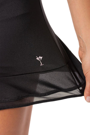 Women's black mesh trim golf skort with 4-way stretch and a light pink martini logo