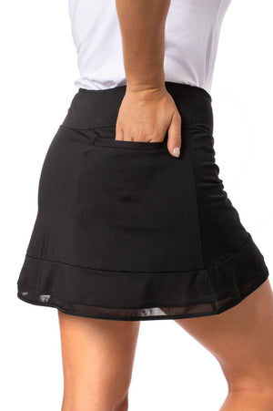 Women's black sport skort with mesh trim and big back scorecard pocket and matching white top