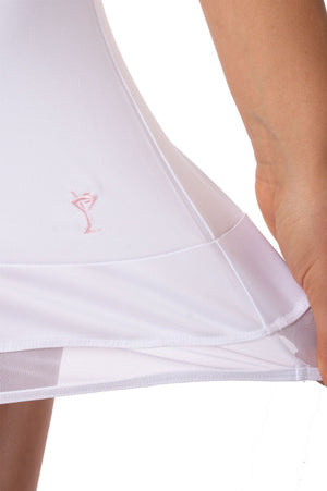 Closeup of mesh trim on Top Golf white sport skort with Golftini's martini logo in light pink